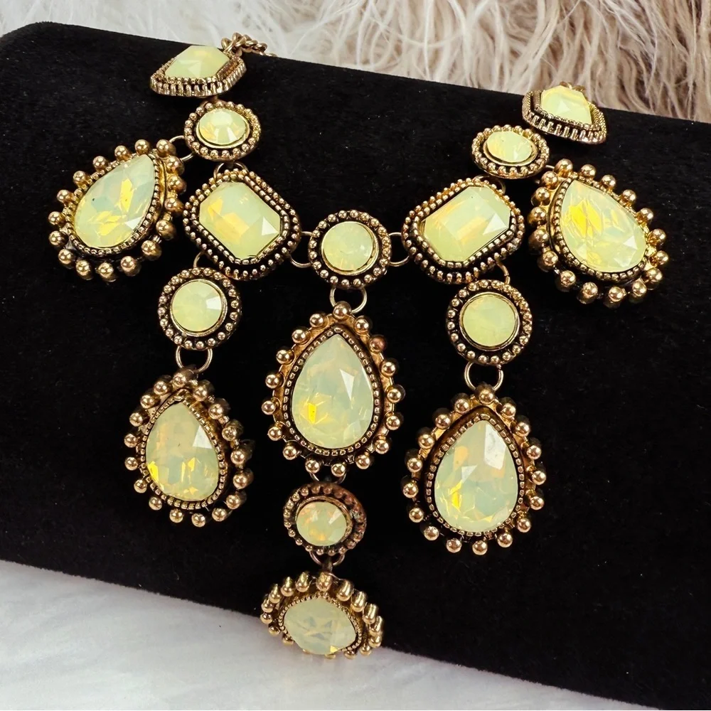 Gorgeous, aged goldtone, reflective statement, bib style necklace